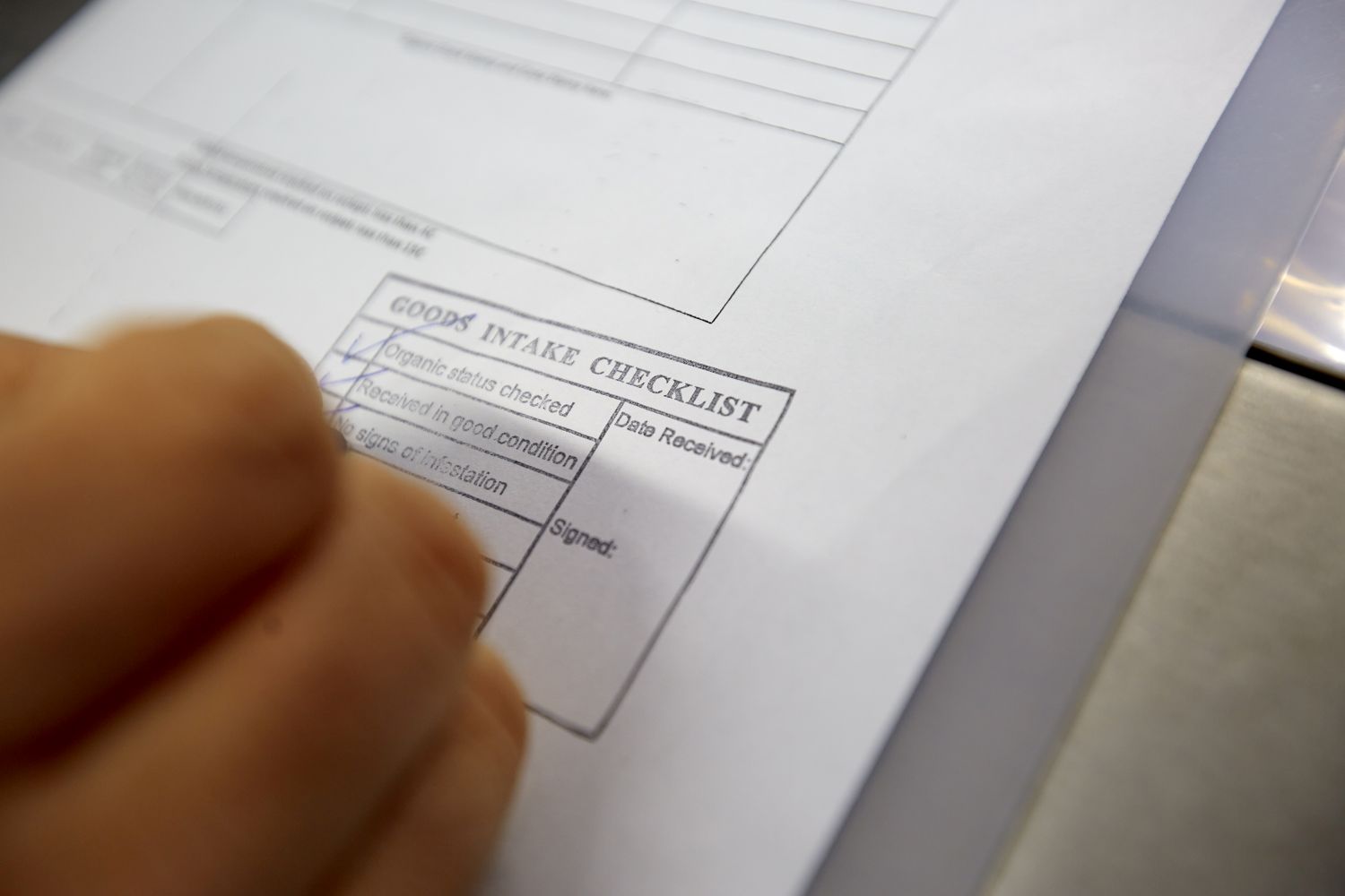 Person completing inspection paperwork
